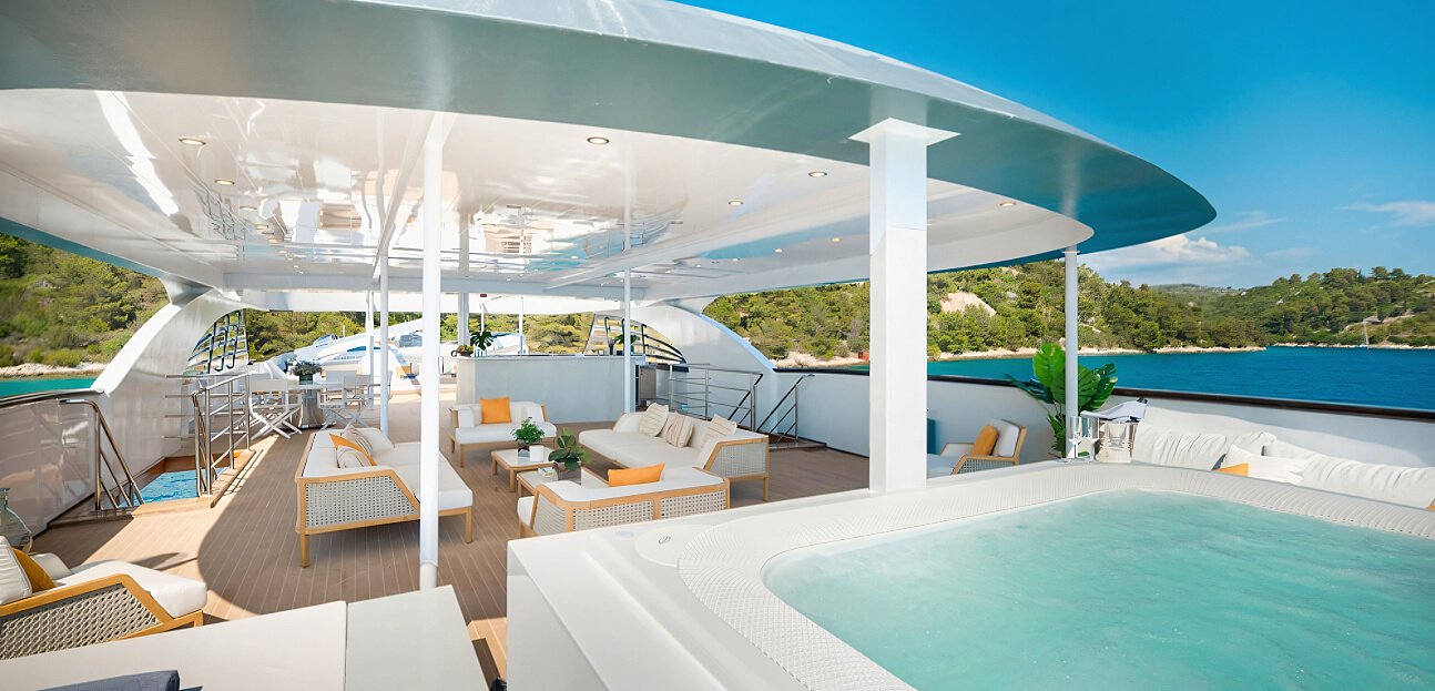 a beautiful yacht deck with jacuzzi and sofa - charter in croatia